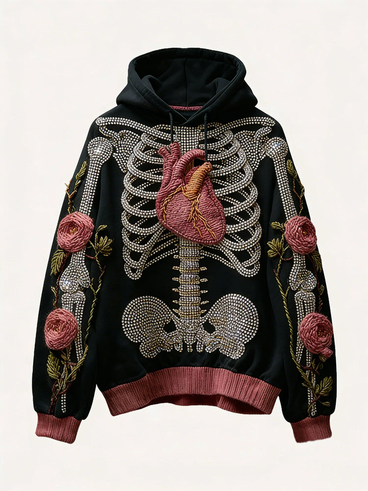 Black hoodie with 3D embroidered skeleton, heart, and floral rose details, relaxed fit.
