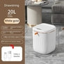 White and gold 20L smart trash bin with drawstring, square design, USB Type-C, UV sterilization, waterproof, in modern living room setting.