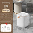 White and gold 20L smart trash bin with drawstring, square design, USB Type-C, UV sterilization, waterproof, in modern living room setting.