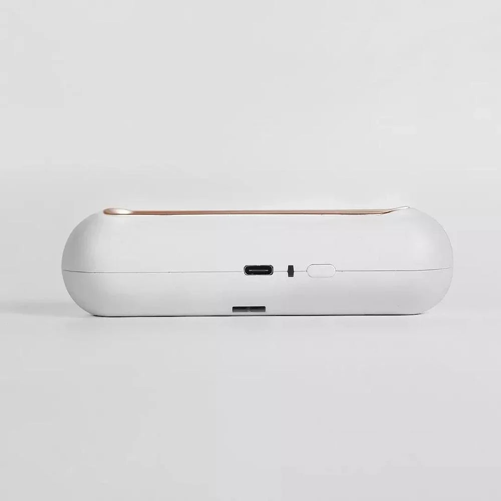 White, minimalist tech accessory with USB-C port, compact and rounded design on white background