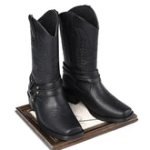 Black faux leather cowboy boots with decorative stitching and harness detail, mid-calf fit.