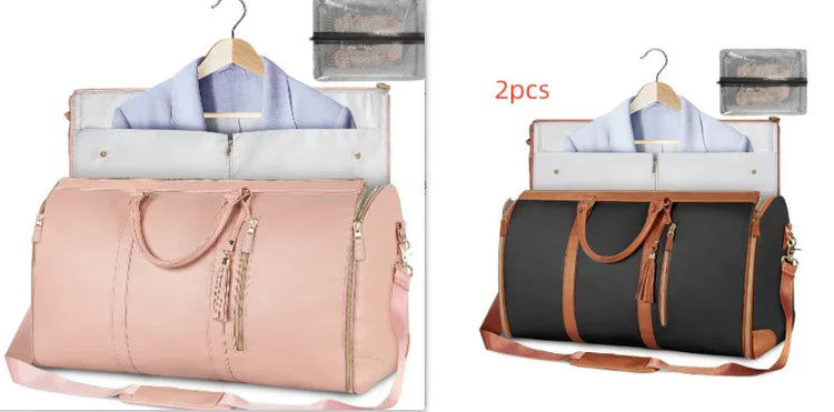 Travel duffel bags in pink and black with leather trim, shown with garment holder and toiletry pouch.