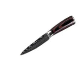 Black and silver Damascus steel paring knife with dark wood handle on white background