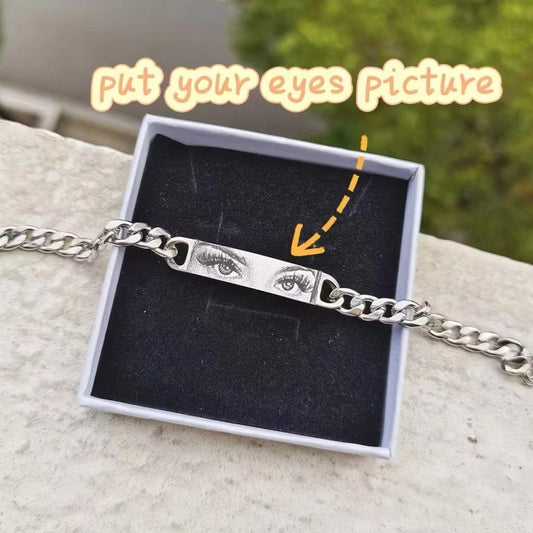 Silver personalized chain bracelet with engraved eyes plate, displayed in a gift box