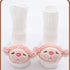 White ribbed baby socks with pink plush animal faces, soft material, cozy fit, cute design
