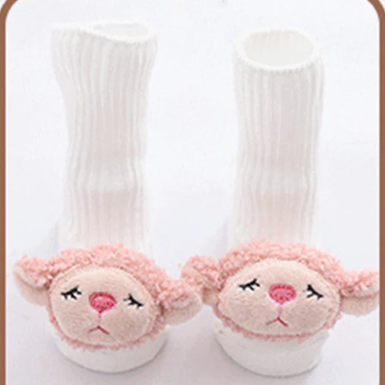 White ribbed baby socks with pink plush animal faces, soft material, cozy fit, cute design