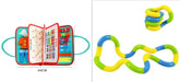 Colorful fidget toy set with flexible, interlocking pieces in blue, green, and yellow, alongside a portable learning kit with various educational tools and accessories.