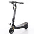 Black electric scooter with wide deck, front suspension, and handlebar key fobs on white background.