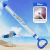 Blue and clear plastic water gun with nozzle effect display, beach background
