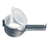 Black and silver plastic egg separator with handle and open lid on white background