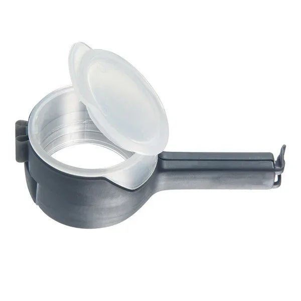 Black and silver plastic egg separator with handle and open lid on white background