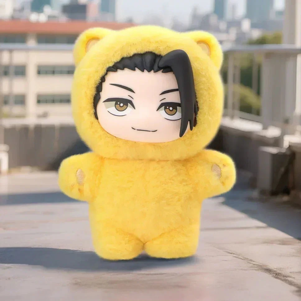 Plush doll in a fuzzy yellow bear costume with black hair, outdoor setting