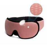 Pink textured breathable sleep mask with soft padding and black trim, ergonomic fit