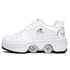 White futuristic sneaker with side perforations and built-in roller skate wheels, chunky sole