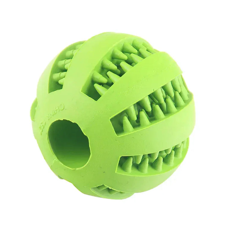 Green rubber ball with grooves and teeth pattern, textured chew toy material.
