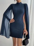 Navy blue fitted mini dress with shimmering accents, sheer cape sleeves, and high neck