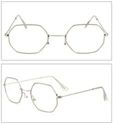 Silver geometric metal glasses with clear lenses, slim frame, minimalist modern style