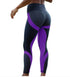 Woman wearing high-waisted black and purple geometric leggings with honeycomb panels