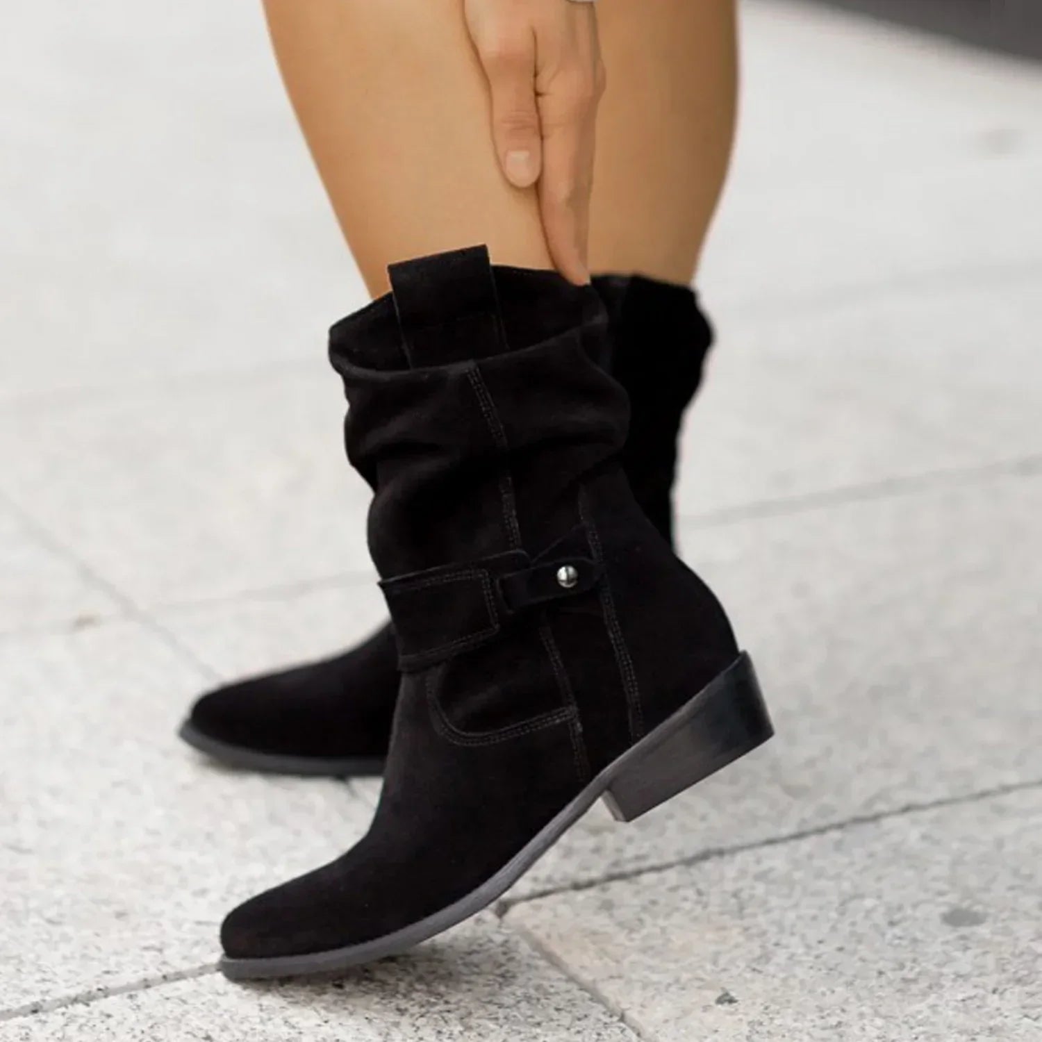 Black suede mid-calf boots with slouchy fit and low block heel, street style fashion