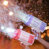 Hands holding colorful plastic bubble guns with LED lights blowing bubbles outdoors at night