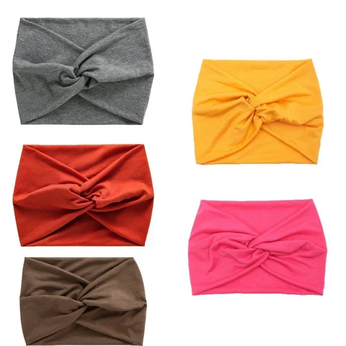 Five cotton twisted headbands in gray, yellow, red, brown, and pink, soft stretch fit.