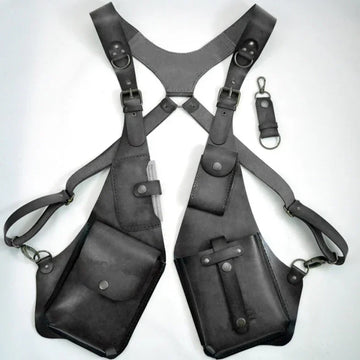 Black leather harness with adjustable straps and multiple utility pockets, modern streetwear accessory