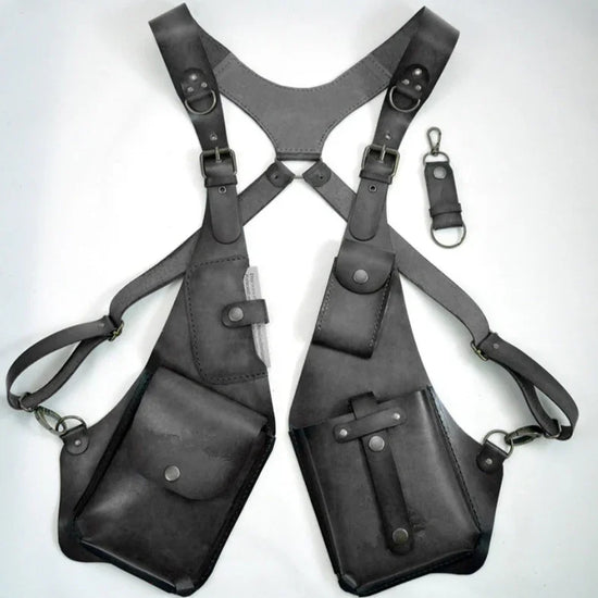 Black leather harness with adjustable straps and multiple utility pockets, modern streetwear accessory