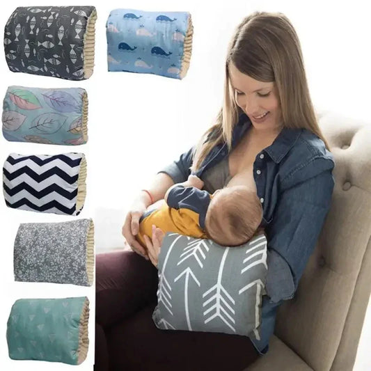 Woman using a grey nursing pillow with white arrow pattern, soft fabric, supportive fit