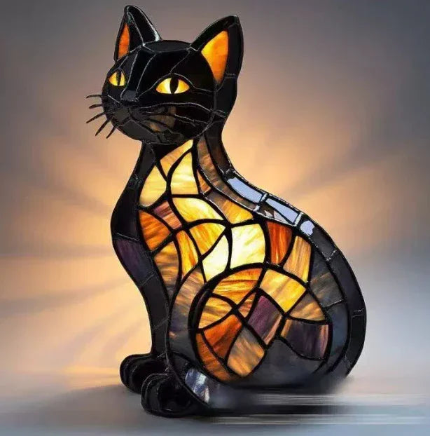 Stained glass cat lamp with glowing amber, black, and yellow glass mosaic design