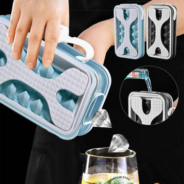 Person using blue and white silicone ice cube tray with diamond-shaped cubes, modern design