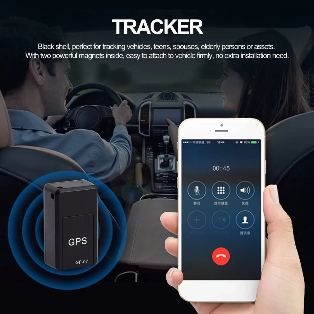Black GPS tracker device with magnetic case, shown with smartphone and modern vehicle interior.