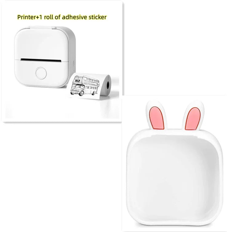 Compact white thermal printer with adhesive sticker roll, bunny ear accessory, minimalist design