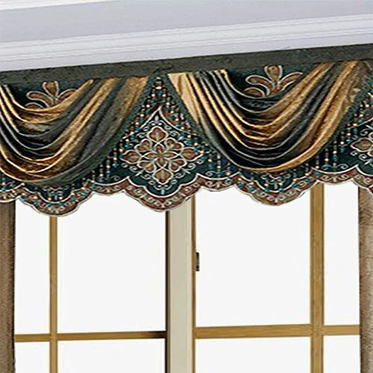 Luxurious gold and green velvet curtain valance with embroidered floral patterns and scalloped edge.
