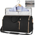 Black duffel garment bag with gold zippers, detachable strap, and lavender blazer inside
