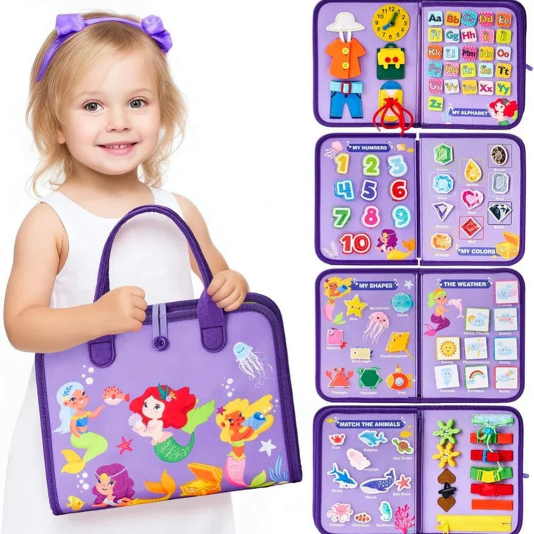 Little girl in a sleeveless white dress holding a purple felt bag with mermaid designs, featuring educational felt puzzles and colorful interactive learning activities inside.