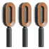 Three modern oval hair brushes with brown and black handles, sleek minimalist design