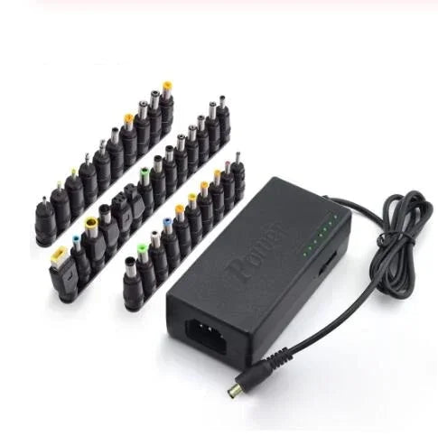 Universal black power adapter with multiple interchangeable plugs, compact tech accessory