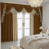 Elegant brown and cream velvet drapes with tassel trim in a luxury bedroom