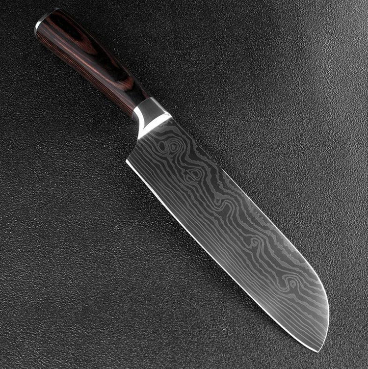 Damascus steel chef knife with dark wood handle and patterned blade on black surface