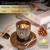 Scented candle for men with teakwood mahogany cedar musk patchouli lemon fragrance and obsidian bracelet in black glass jar on wooden coaster