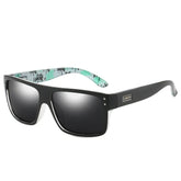 Black square-frame sunglasses with gradient lenses and mint green patterned inner arms