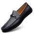 Black leather slip-on loafer with metal buckle, visible stitching, and flexible sole