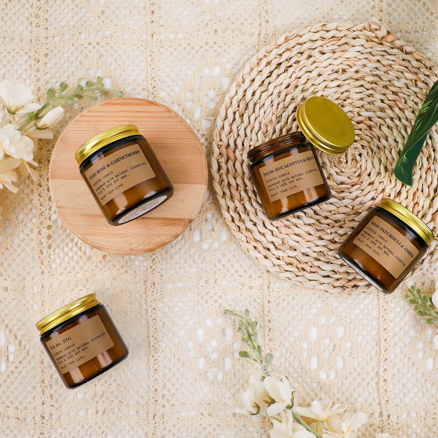Feibao 8 pack amber jar scented soy wax candles with gold lids on woven placemats and lace background
