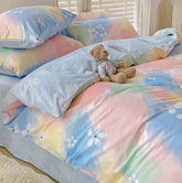 Gradient color bed set with cotton fabric and pastel tones featuring floral patterns and plush toy on bed