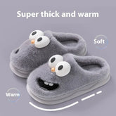 Gray plush slippers with cartoon face, thick faux fur, warm indoor slip-on style