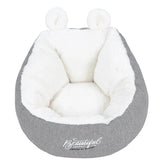 Gray and white plush pet bed with faux fur lining and round ear details, cozy fit