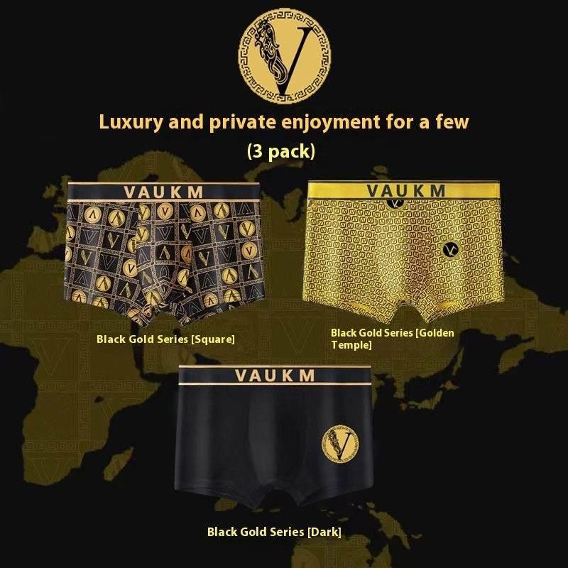 Three men's boxer briefs in black and gold, modern fit, premium soft material, geometric patterns.