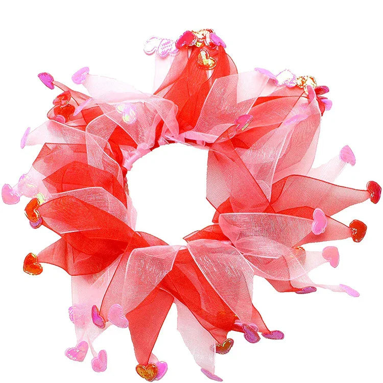 Red and pink sheer mesh scrunchie with heart-shaped accents, lightweight accessory