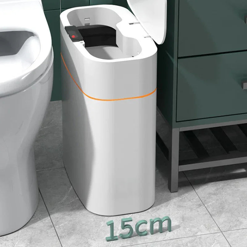 Slim white plastic bathroom trash can with lid, narrow fit beside toilet, 15cm wide.
