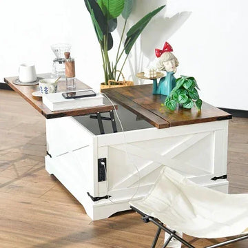Modern white and brown wooden lift-top coffee table with split tabletop, decorative figurine, houseplants, and coffee setup in a bright living room.